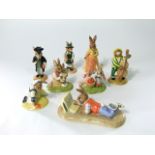 A collection of boxed Royal Doulton Bunnykins figures including On-Line DB238, Tennis DB278 and