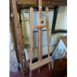 A contemporary Winsor and Newton beechwood floor standing A framed adjustable artists easel,