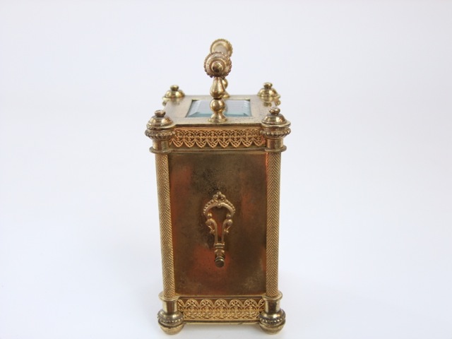 A late 19th century brass carriage clock, the casework with filigree and other detail enclosing a - Image 2 of 4