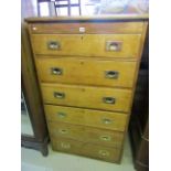 An oak chest with six drawers, brass flush fitting handles 148cm high x 87cm wide, (possibly