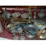 A large collection of 19th century and other brass ware including three copper kettles, jam pan, a