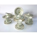 A collection of Royal Doulton Tonkin pattern dinner wares pattern no TC1107 comprising a pair of