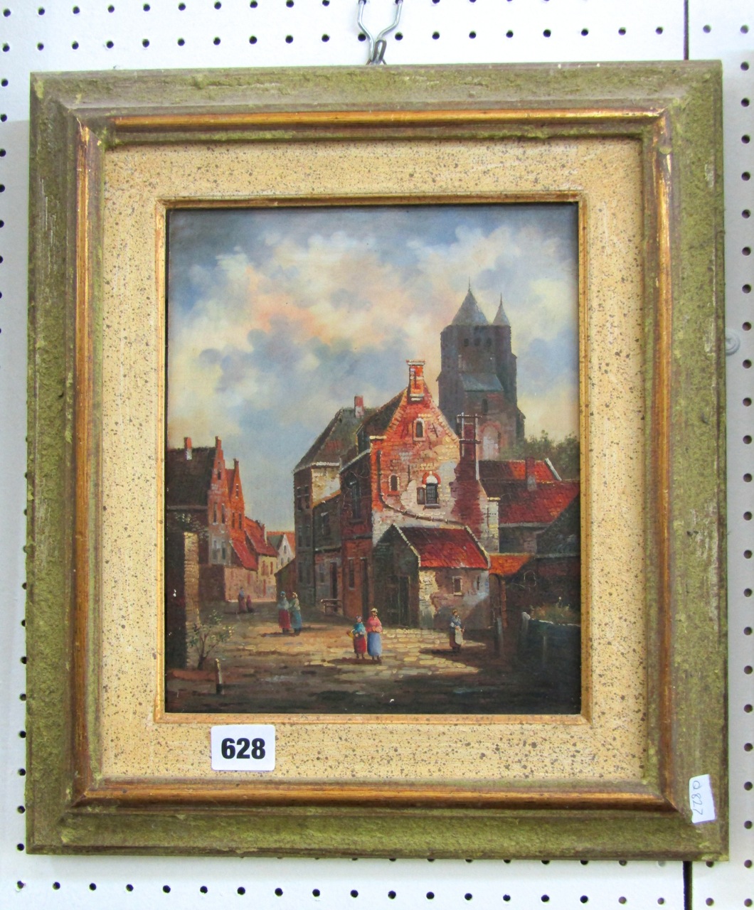 A 20th century oil painting on board in the 19th century manner showing a continental street scene
