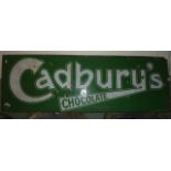 A vintage enamel sign of rectangular form advertising Cadbury's Chocolate, with mint green ground