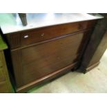 A 19th century continental mahogany commode/washstand of four long drawers flanked by fluted