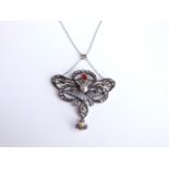 A Belle Epoque/Art Nouveau ruby diamond and pearl pendant necklace in unmarked white/yellow metal on