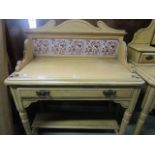 A matching Victorian cottage dressing table and washstand, each with grained and stencilled