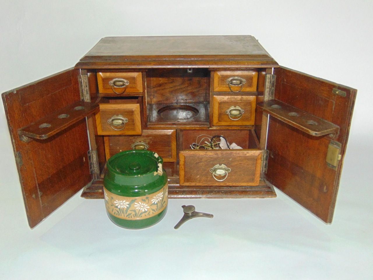 A Victorian smokers cabinet enclosed by two doors, the interior fitted with a ceramic jars and six - Image 2 of 3