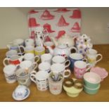 A collection of contemporary kitchen wares including a set of three Penguin book mugs, two Kellogg's