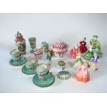 A collection of Royal Doulton figures comprising Ascot HN2356, Vanity HN2475, The Balloon Seller