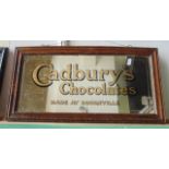 An early 20th century advertising mirror 'Cadbury's Chocolates, Made at Bourneville' with gilded