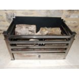 An Amhurst polished steel fire basket, 56 cm width, 30 cm deep, 30 cm high, retailed by Chesney's