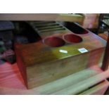 A vintage mahogany coin tray/till made from a single block with cut out receptacles, together with a