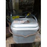 Three galvanised watering cans of varying design and capacity together with a tureen and cover