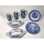 A collection of blue and white printed ceramics including a set of three graduated Britannia pottery