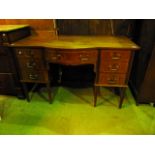 An inlaid Edwardian mahogany dressing table with satinwood banding and string inlaid detail, the