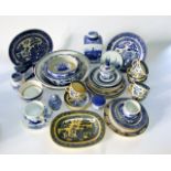 A collection of blue and white printed ceramics including a reproduction ironstone caddy and