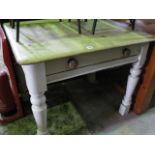 A Victorian pine scrubbed top kitchen table of rectangular form with moulded outline raised on