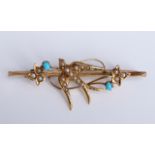 A 15ct gold turquoise and seed pearl swallow brooch