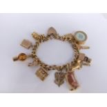 A 9ct gold charm bracelet, approx gold weight 42g