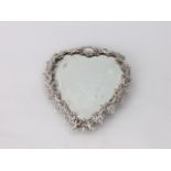 A good quality late 19th century heart shaped dressing table mirror, the silver plated frame