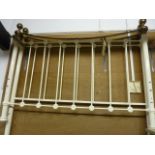 A Victorian style brass and cream painted iron bedstead with flower head medallion to rails