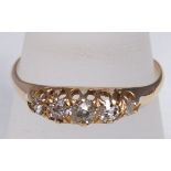 An 18ct gold five stone diamond ring set with old cut diamonds 2.3g, ring size P, approx diamond