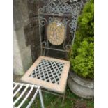 Two pairs of contemporary folding steel framed garden terrace chairs, with lattice work and scrolled