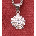 A diamond pendant necklace set with a single brilliant cut diamond approx 0.60ct in 18k white gold