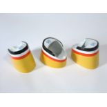 A set of three Hapag Bayreuth Bavarian ashtrays in the form of ship's funnels decorated in yellow