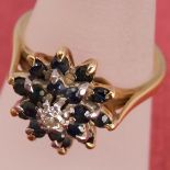 An 18ct gold sapphire and diamond cluster/flower ring, 6g approx