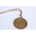 A 22ct Isle of Man gold half sovereign dated 1965 bezel mounted in unmarked yellow metal with