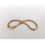 An 18ct white and yellow gold twist link bracelet, 4.3 g