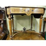 A 19th century continental sofa table with geometric and further mixed wood marquetry