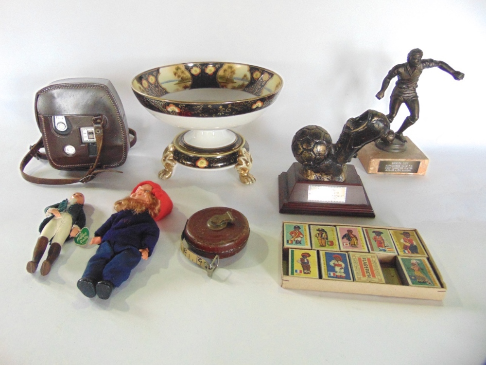 A mixed lot to include noritake pedestal comport, various footballing trophies, tape measures,