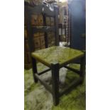 A set of six rustic ladder back side chairs, principally in fruit wood, with woven seats