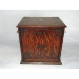 Interesting late 19th century oak smokers box, with levered fall front enclosing a fitted