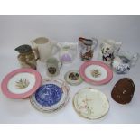 A collection of 19th century and other jugs including a Parian type relief moulded example with