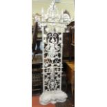 A 19th century cast iron hallstand of full height by Coalbrookdale with chrub, mask and fruiting