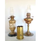 Late 19th century brass and copper oil lamp in the Arts & Crafts manner, together with a further