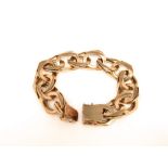 A late 20th century 9ct gold curb link bracelet, 61g