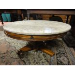 A contemporary occasional table, the square cut column supporting a circular polished marble top,