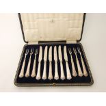 Edwardian silver handled canteen of fancy cutlery for six