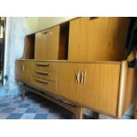 G Plan Fresco teak sideboard, the raised back fitted with sliding door and a full front door over