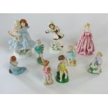 A collection of Royal Worcester figures including Grandmothers Dress and December, both modelled