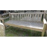 A Barlow Tyrie four seater teak wood garden bench