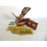 A Victorian mahogany stereoscope viewer together with a collection of slides (AF)
