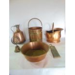 Mixed copper lot to include a brass and copper log bin, eastern coppered jug, helmet coal scuttle