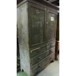 A mid 19th century pine linen cupboard, the lower section fitted with two long and two short