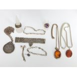 A collection of silver jewellery to include a gate link bracelet, a paste set silver ring, a